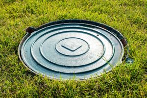manhole on grass